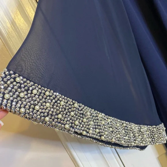 Brand: Xscape
Size: 22W, PTP- 24” w/ some stretch, Length- 42”
Color: Navy Blue - Picture 3 of 3